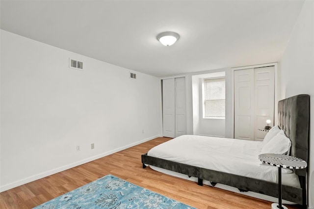 bedroom featuring hardwood / wood-style floors