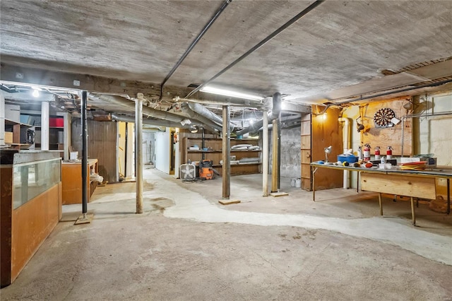 basement with a workshop area