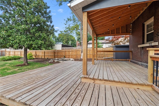 deck featuring a lawn