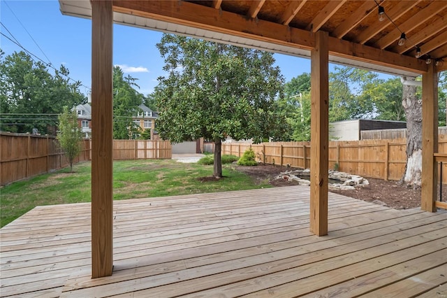 deck featuring a yard