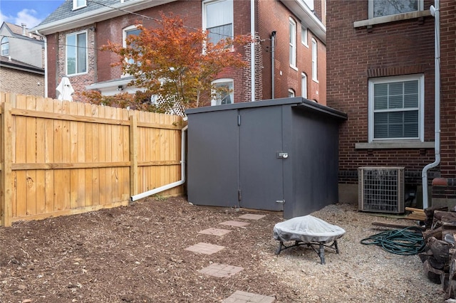 view of yard featuring central air condition unit