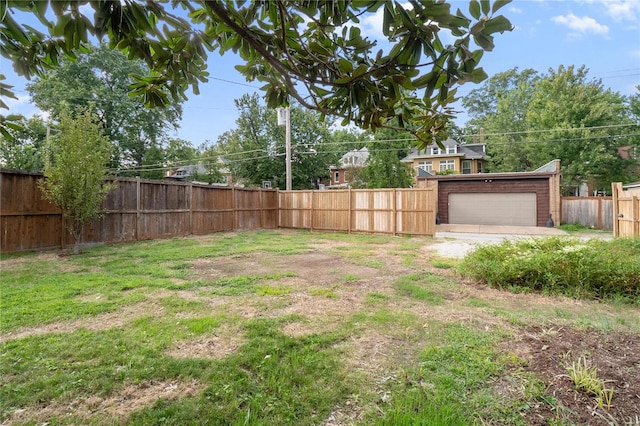 view of yard featuring a garage