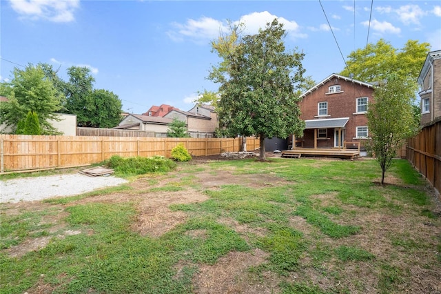 view of yard with a deck