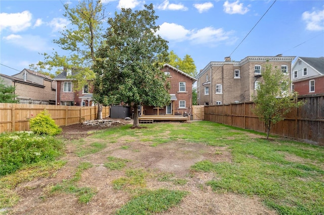 view of yard with a deck