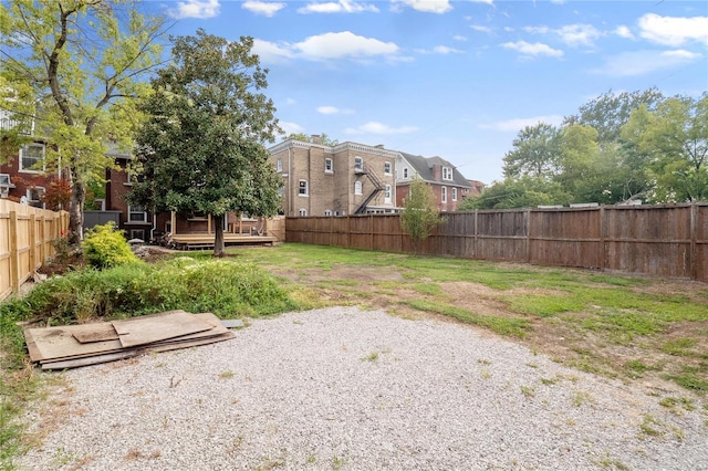 view of yard featuring a wooden deck