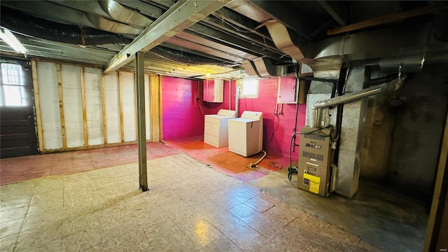 basement with washer and clothes dryer