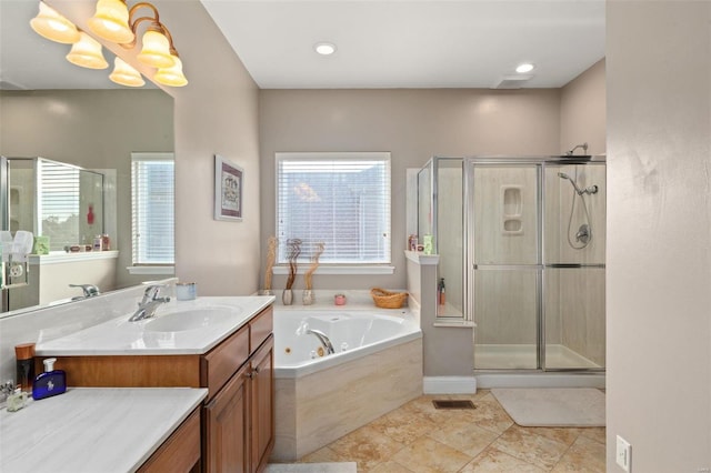 bathroom featuring vanity, shower with separate bathtub, a chandelier, and tile patterned flooring