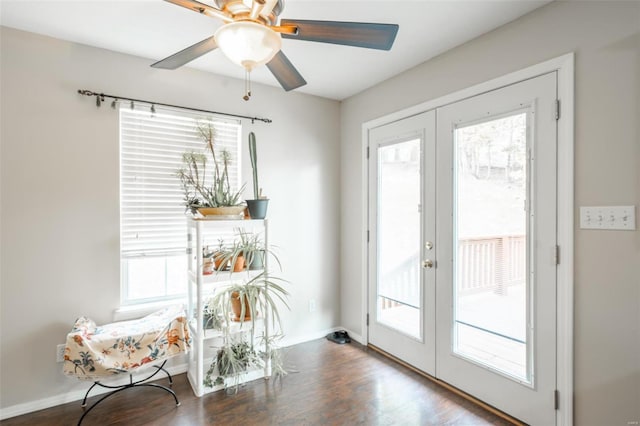 doorway with french doors, hardwood / wood-style floors, and ceiling fan