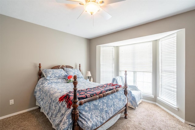 bedroom featuring ceiling fan and carpet floors