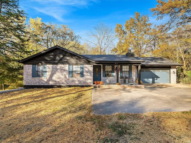 ranch-style house with a front lawn and a garage