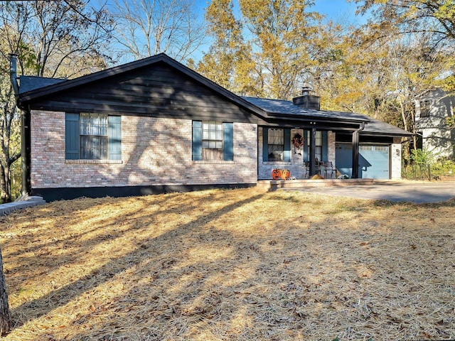 ranch-style home with a garage