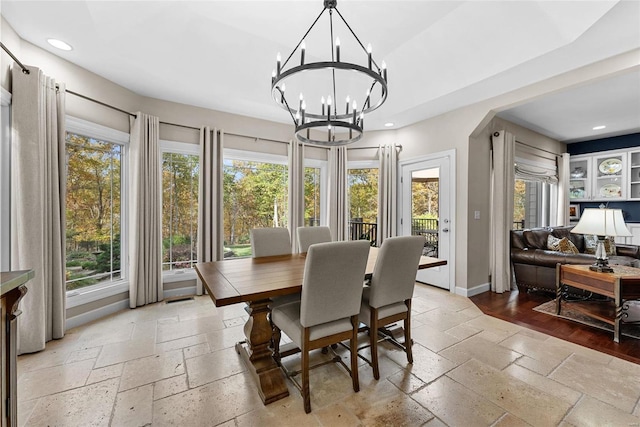 dining room featuring a notable chandelier