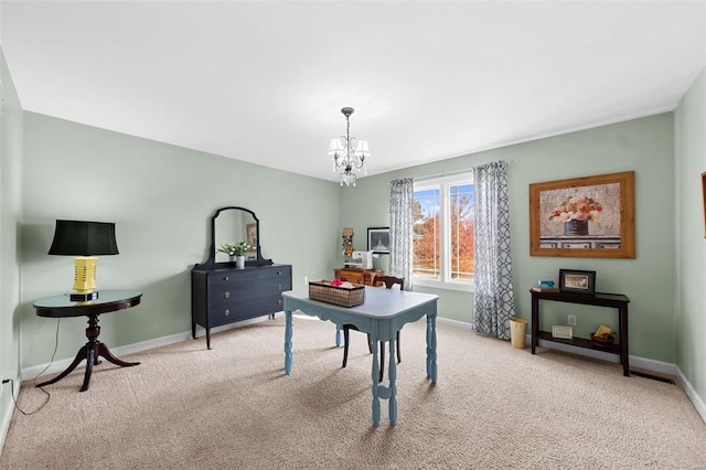 carpeted office space featuring an inviting chandelier