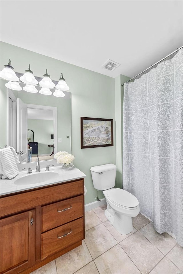 bathroom featuring vanity, toilet, a shower with shower curtain, and tile patterned flooring