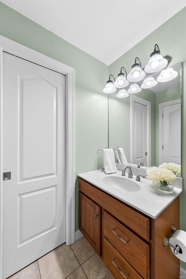 bathroom with vanity and tile patterned floors