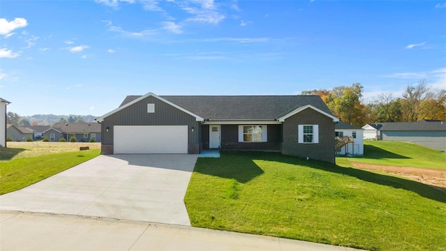 view of front facade featuring a front yard and a garage