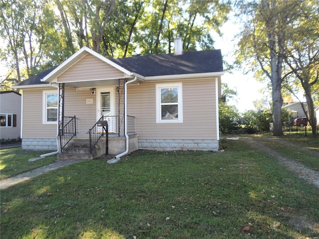 view of front of home with a front yard