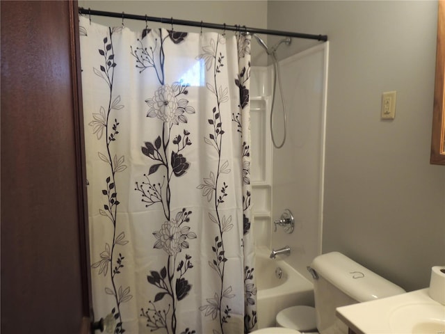 full bathroom featuring vanity, toilet, and shower / bathtub combination with curtain