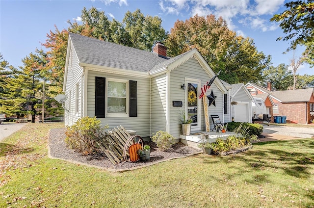 view of front facade featuring a garage and a front yard