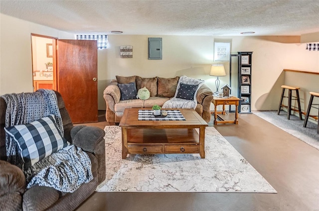 living room featuring sink, electric panel, and a textured ceiling