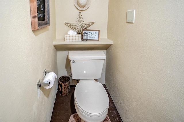 bathroom featuring toilet