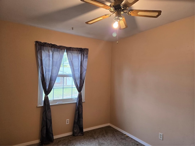 carpeted empty room with ceiling fan