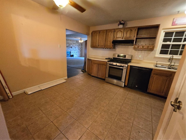 kitchen with dishwasher, backsplash, sink, stainless steel stove, and ceiling fan