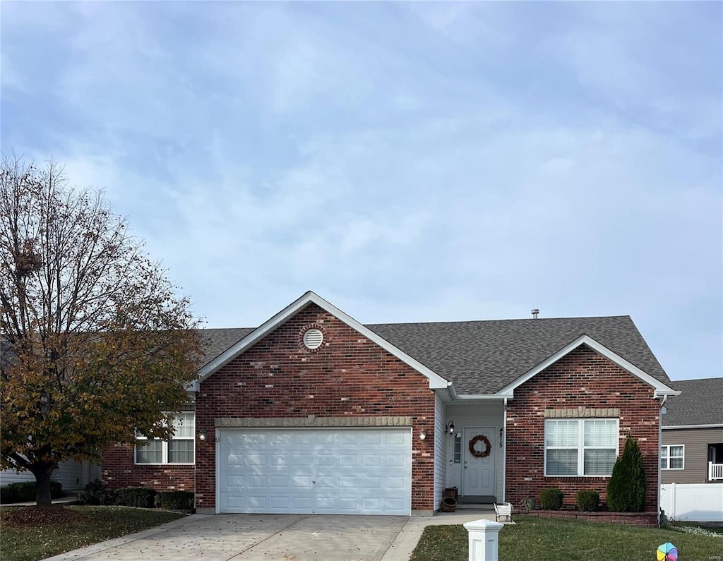 single story home featuring a garage