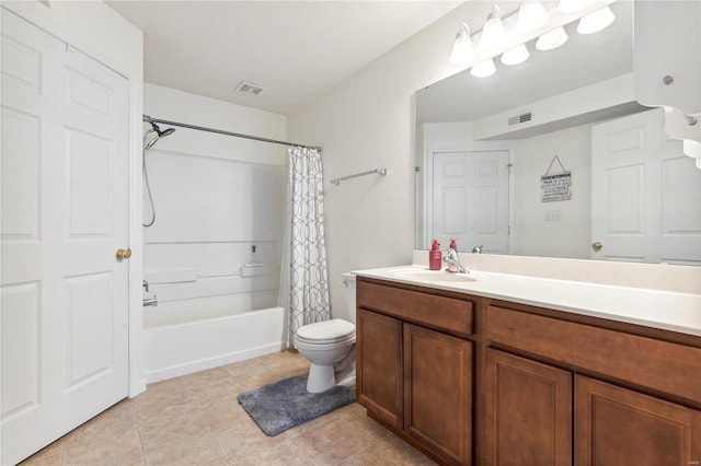 full bathroom featuring toilet, tile patterned flooring, vanity, and shower / tub combo