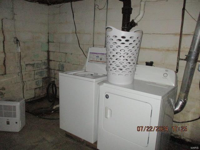 laundry area featuring independent washer and dryer