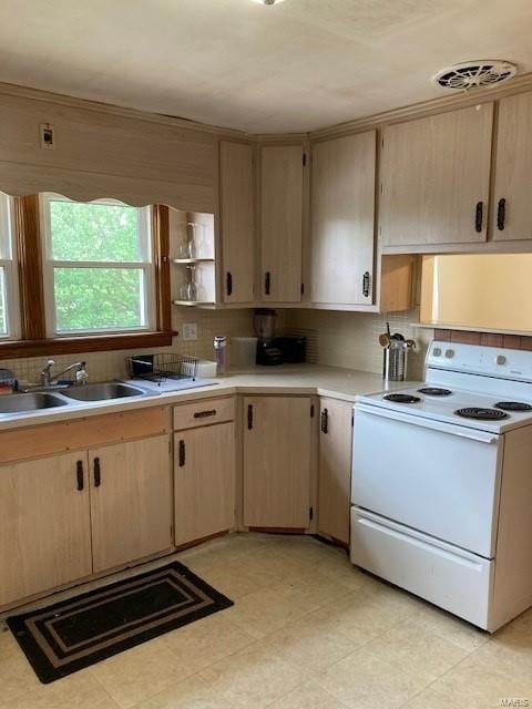 kitchen featuring white electric range, backsplash, light brown cabinetry, and sink