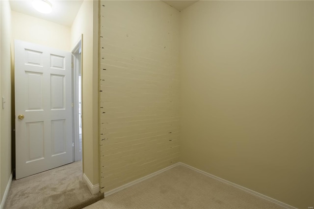 interior space featuring light colored carpet