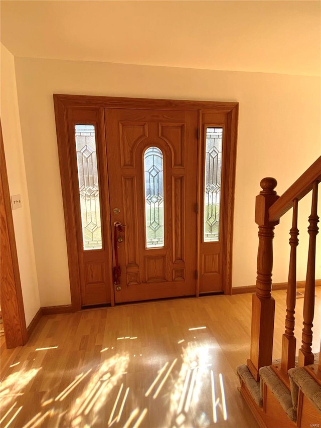 foyer with light hardwood / wood-style flooring