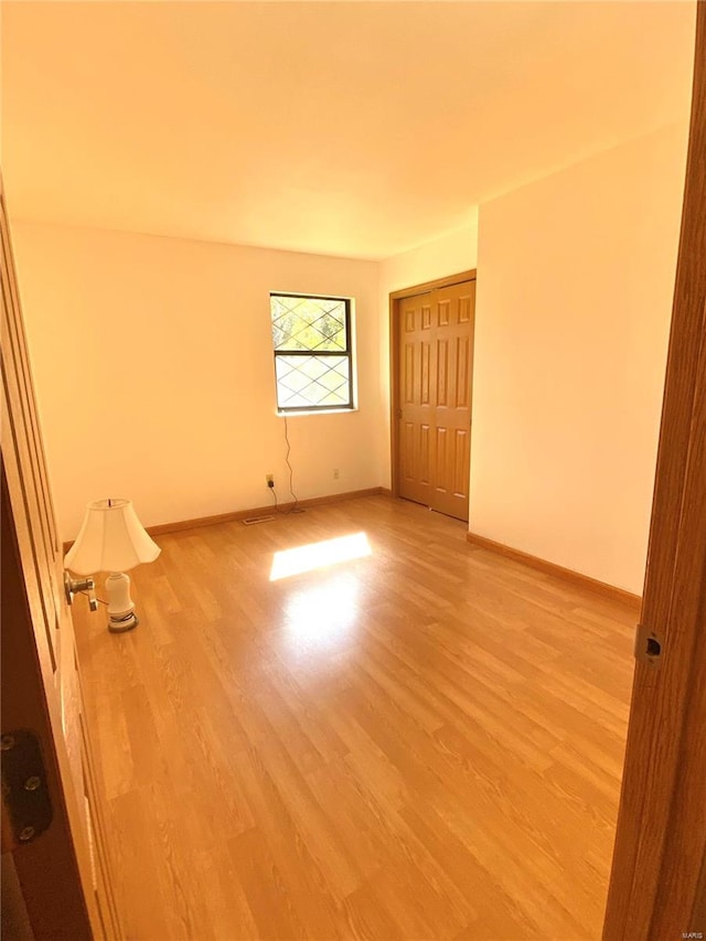 empty room featuring light wood-type flooring