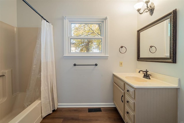 bathroom with vanity, shower / bath combo, and wood-type flooring