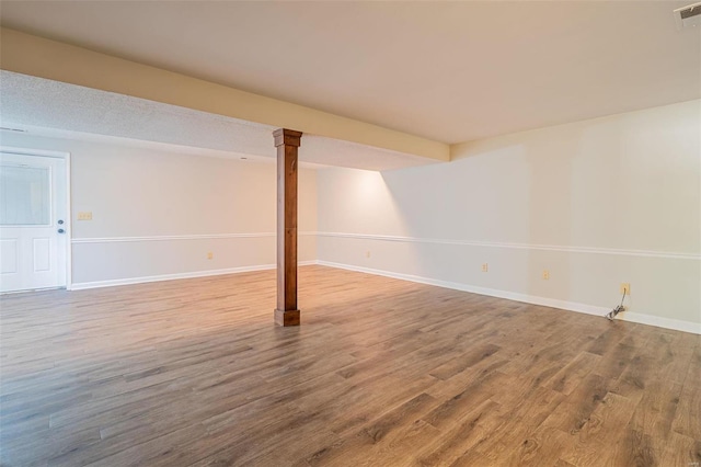 basement with wood-type flooring