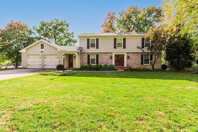 view of front facade featuring a front lawn and a garage