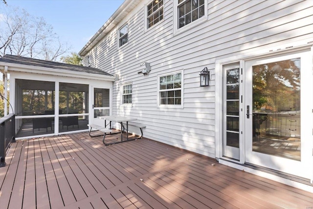 wooden terrace with a sunroom