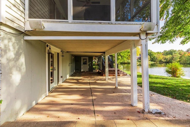 view of patio featuring a water view