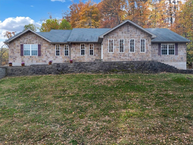 view of front of home with a front yard