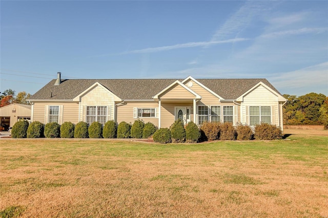 ranch-style house with a front yard