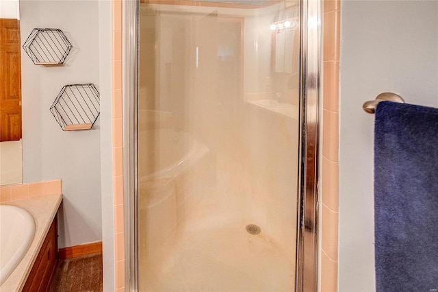 bathroom featuring an enclosed shower