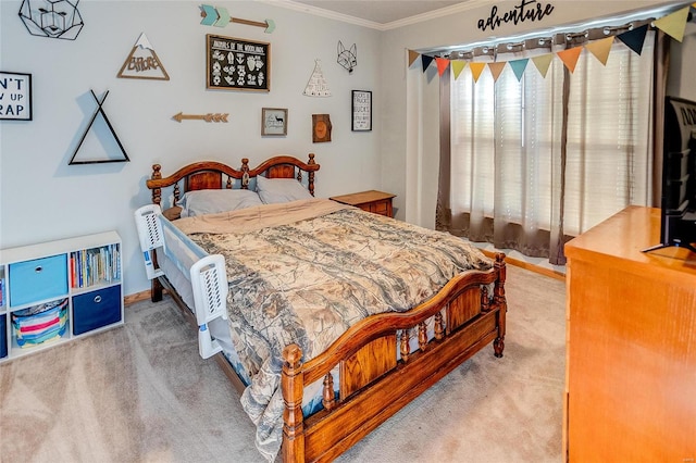 bedroom with crown molding and carpet flooring