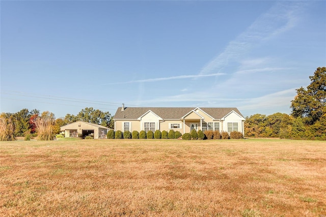 single story home featuring a front lawn