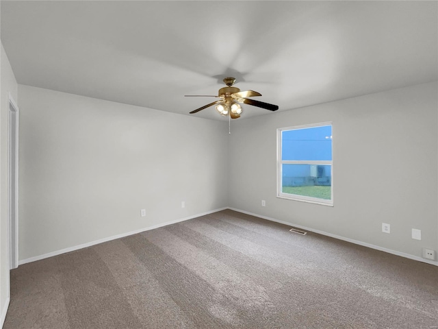 unfurnished room with carpet floors and ceiling fan