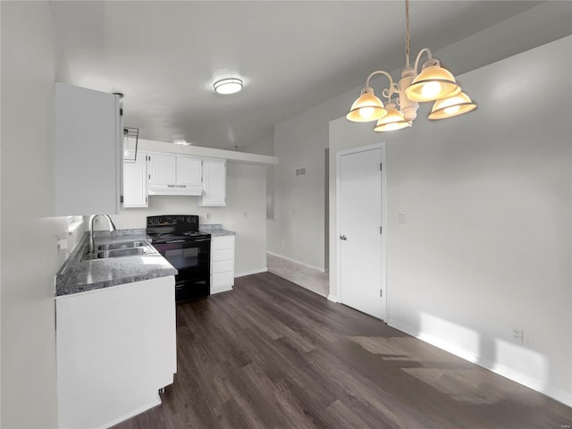 kitchen featuring black electric range oven, dark wood-type flooring, hanging light fixtures, sink, and white cabinetry