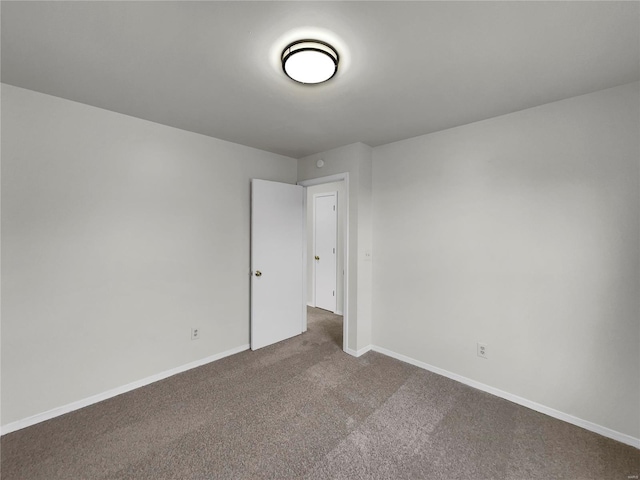 unfurnished room featuring carpet floors