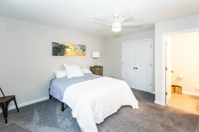 bedroom featuring dark carpet, a closet, and ceiling fan