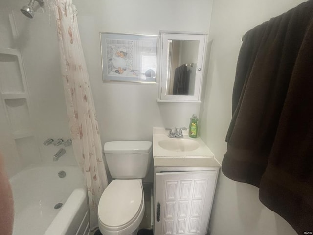 full bathroom featuring vanity, toilet, and shower / bath combo with shower curtain