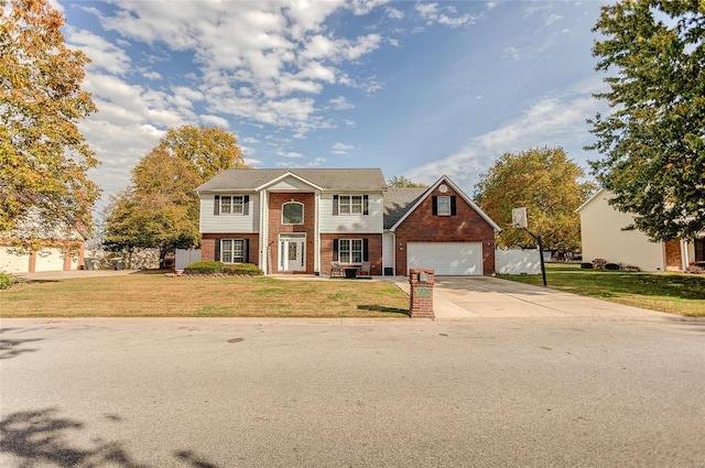 view of front of house featuring a front yard and a garage